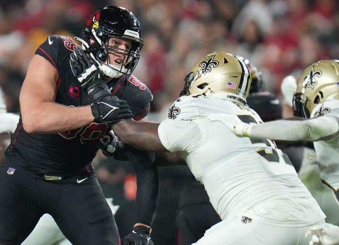 Arizona Cardinals defensive end J.J. Watt (99) tries to get past New Orleans Saints guard Cesar Ruiz (51) at State Farm Stadium. Mandatory Credit: Joe Rondone-Arizona Republic